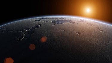 Computersimulation: Eine Sonne geht über einem Planeten auf. | Bild: picture-alliance/dpa