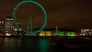 Das Riesenrad London Eye wird 2021 anlässlich des St. Patrick's Days grün beleuchtet. Zahlreiche Sehenswürdigkeiten werden weltweit bei der Kampagne am St. Patrick's Day gleichzeitig grün beleuchtet. | Bild: David Parry/PA Wire/dpa