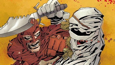 Titelbild der Graphic Novel Holy Terror: Ein roter Superheld gibt einem weiß bandagierten islamistischen Kämpfer mit Säbel in der Hand einen Faustschlag ans Kinn. | Bild: Legendary Comics
