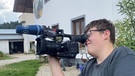 young reporter 2022: Nico mit Kamera. | Bild: BR 