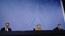 ARCHIV - 05.01.2021, Berlin: Merkel (CDU), Söder (CSU, r), Müller (SPD). | Bild: dpa-Bildfunk