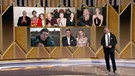 Das vom TV-Sender NBC veröffentlichte Foto zeigt Schauspieler Joaquin Phoenix, der die Kategorie "Beste Schauspielerin in einem Filmdrama" bei den Golden Globe Awards 2021 auszeichnet, während die Nominierten Viola Davis (oben, l-r), Andra Day, Vanessa Kirby, sowie Frances McDormand (unten, l-r) und Carey Mulligan auf einer Leinwand zu sehen sind. | Bild: NBC/AP/dpa
