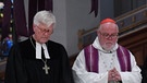 Der evangelische Landesbischof von Bayern, Heinrich Bedford-Strohm, neben dem Münchner Kardinal Reinhard Marx. | Bild: Picture Alliance/dpa/Felix Hörhager