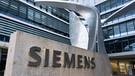 Der Schriftzug "Siemens" vor der Firmenzentrale in München.  | Bild: dpa-Bildfunk/Sven Hoppe