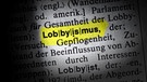 Das Wort Lobbyismus ist in einem Lexikon angestrichen | Bild: picture-alliance/dpa