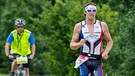 Die Triathleten James Cunnama und Timo Bracht 2012 beim Challenge Roth | Bild: picture-alliance/dpa