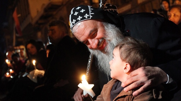 Mor Ignatius Aphrem II  mit Kind | Bild: picture-alliance/dpa