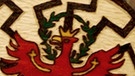 Das Südtirol-Wappen im Sonnenbanner der SS - Fundstücke bei Südtiroler Neonazis  | Bild: BR, Ernst Eisenbichler; Polizei