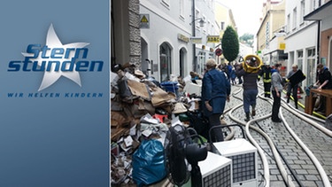 In Passau beginnen die Anwohner mit Aufräumarbeiten  | Bild: BR, Lars Martens