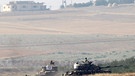 Türkische Panzer im syrisch-türkischen Grenzgebiet | Bild: REUTERS/Stringer