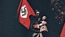 Nürnberg: Madonna mit einer Hakenkreuz-Fahne im Jahr 1936. | Bild: Agentur Karl Höffkes/BR/DOKfilm Fernsehproduktion GmbH