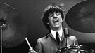 epa02773775 A handout image provided by Christie's on 10 June 2011 shows a B/W photograph of the Beatle Ringo Starr playing his drums during a concert in 1964. This picture, taken by the photographer Mike Mitchell when he was 18 years old, is part of a collection comprising 50 lots of unpublished and never-before-seen photographs of the Beatles' first visits to the US in 1964. The works were unveiled on 10 June 2011 at Christie's auction house in London, Britain and will go under the hammer at its New York branch on 20 July. The complete collection is expected to reach a price of 69,000 Euros. EPA/MIKE MITCHELL / CHRISTIE'S / HO ONE TIME USE ONLY IN CONNECTION WITH PREVIEW OR REVIEW OF THE RELEVANT AUCTION SALE; MANDATORY CREDIT HANDOUT EDITORIAL USE ONLY/NO SALES/NO ARCHIVES | Bild: dpa/picture-alliance