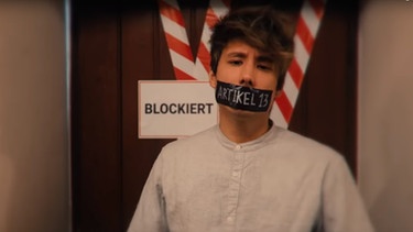 YouTuber Julian Bam protestiert gegen den Artikel 13 der Richtlinie des Europäischen Parlaments und des Rates über das Urheberrecht im digitalen Binnenmarkt. | Bild: Screenshot YouTube