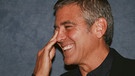 George Clooney lacht | Bild: mauritius-images