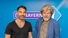 BAYERN 1 Moderator Marcus Fahn und Reinhold Messner stehen nebeneinander im BAYERN 1 Studio. | Bild: BR, Max Hofstetter