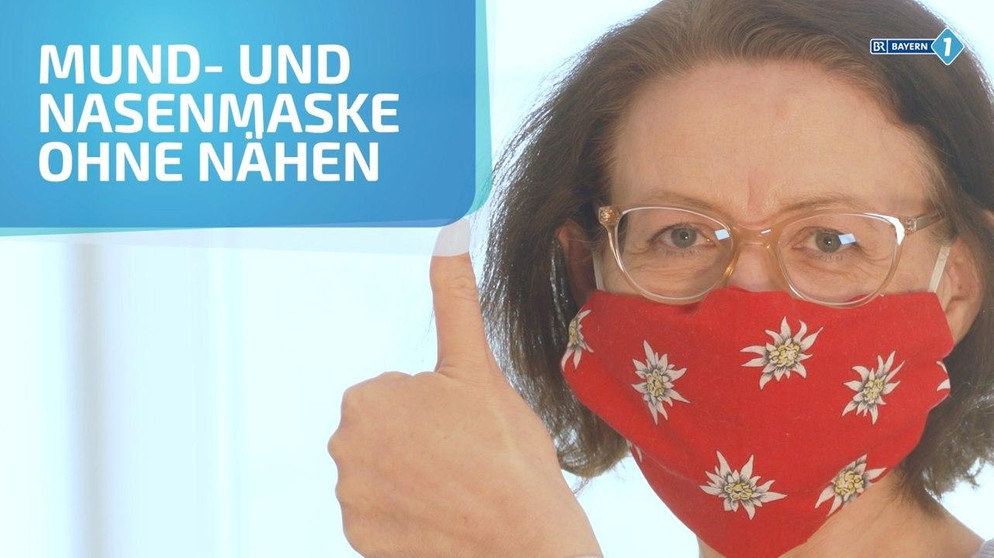 Frau mit einer Maske aus Halstuch | Bild: BR/Bogdan Kramliczek