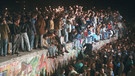 Am 8. November 1989 fällt die Berliner Mauer. | Bild: picture-alliance/dpa