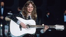 Sängerin Nicole bei ihrem Auftritt in Harrogate beim Grand Prix de la Chanson d'Eurovision 1982. | Bild: picture-alliance/dpa