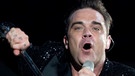 Robbie Williams live im Juli 2013 in Gelsenkirchen | Bild: picture-alliance/dpa