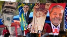 Handtücher mit Porträts der brasilianischen Präsidentschaftskandidaten Bolsonaro und Lula sowie mit Bildern von Geldscheinen werden in Brasilia von einem Straßenhändler auf einer Wäscheleine zum Verkauf angeboten | Bild: dpa-Bildfunk/Eraldo Peres