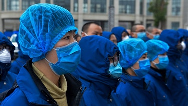 Medizinisches Personal in Hubei, China | Bild: picture-alliance/dpa