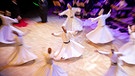 Drehende Derwische. Tanz und Musik der Sufis (Symbolbild) | Bild: picture alliance_ZUMAPRESS.com_Tolga Ildun