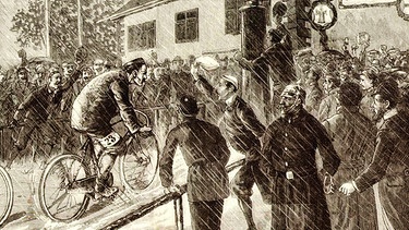 Radrennen Mailand-München 1894. Ankunft des Siegers in München bei strömendem Regen, am 12. Juni um 1 Uhr 12 Min. nachmittags. | Bild: Bildarchiv: cycling4fans