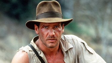 US-Schauspieler Harrison Ford als wagemutiger Archäologe Indiana Jones (1984) | Bild: picture-alliance/dpa/Fotoreport/Bert Reisfeld