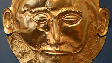 Eine Nachbildung der "Totenmaske des Agamemnon", eines der bekanntesten Fundstücke von Heinrich Schliemann | Bild: picture-alliance/dpa