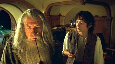 Zauberer Gandalf und Frodo aus dem Film "Herr der Ringe" | Bild: picture-alliance/dpa