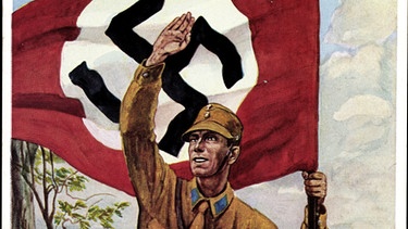 NS-Propaganda: SA-Mann mit Flagge | Bild: picture-alliance/dpa