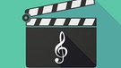 Filmklappe mit aufgemaltem Violinschlüssel | Bild: colourbox.com