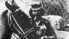 Ernesto Che Guevara mit seinem Maultier Chico | Bild: picture-alliance/dpa