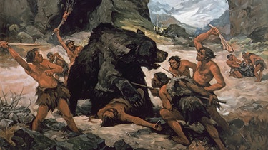 Urmenschen auf der Höhlenbärenjagd. Zeit des Neandertalers, letzte Zwischeneiszeit. Farbdruck, 1937, von F. Roubal. | Bild: picture-alliance / akg-images
