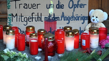 Kerzen für die Opfer des Anschlags auf den Berliner Weihnachtsmarkt | Bild: picture-alliance/dpa