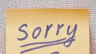 "Sorry" steht in Handschrift geschrieben auf einem Posted. | Bild: Colourbox.com/Zhenikeyev