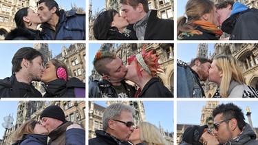 Liebespaare küssen sich am Valentinstag in München vor dem Rathaus | Bild: picture-alliance/dpa