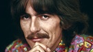 Der "schweigsame" Beatle George Harrison. | Bild: picture-alliance/dpa