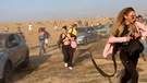 Israelische FestivalbesucherInnen fliehen vor Hamas-Terroristen  | Bild: Youtube Screenshot