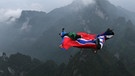 Ein Wingsuit-Flieger während eines Wettbewerbs in China | Bild: picture-alliance/dpa