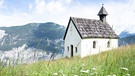 Bayerische Kapelle in den Alpen. | Bild: stock.adobe.com/fottoo