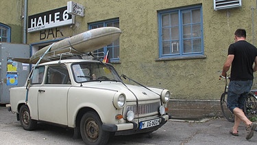 Impression aus dem Quartier Urban Neuhausen: Kajak auf dem Dach eines alten Autos | Bild: Urban16