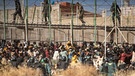 Rund 2000 Migranten aus afrikanischen Ländern südlich der Sahara versuchten im Juni 2022, von Marokko aus in die spanische Exklave Melilla zu gelangen. Dabei kamen Menschen ums Leben, zahlreiche wurden verletzt. | Bild: picture alliance / ASSOCIATED PRESS | Javier Bernardo