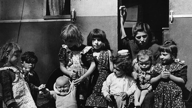 Sinti-Familie in einer sogenannten "Landfahrersiedlung" in der Nähe von München (1950) | Bild: Juliette Lasserre
