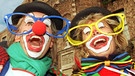 Maskiertes Paar feiern am Faschingsdienstag | Bild: picture-alliance/dpa