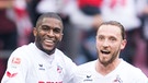 Kölns Torschütze Anthony Modeste (l) und Marco Höger jubeln nach dem Führungstreffer zum 1:0 | Bild: dpa-Bildfunk
