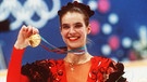 Katarina Witt mit Olympia-Gold 1988 | Bild: picture-alliance/dpa