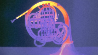 Das Wärmebild zeigt, wo das Horn beim Musizieren besonders beansprucht und entsprechend warm wird. | Bild: Heribert Schindler / Fraunhofer-IFAM Dresden