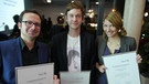 Robert Stöger, Michael Bartlewski und Lisa Altmeier (v. l. n. r.) freuen sich über den Journalistenpreis Informatik | Bild: BR/Robert Stöger